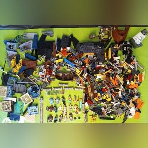 Legos, don't go to jail stealing these. Mini figures Mixed Bricks and weapons.